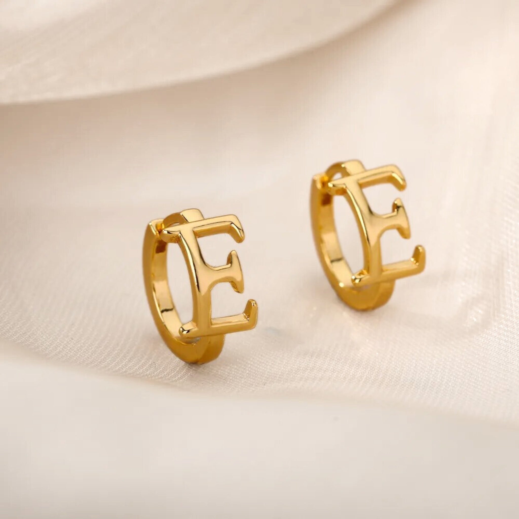 Amara Alphabet Huggie Earrings