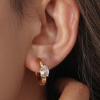 18K Gold Plated Stainless Steel Hypoallergenic Waterproof Tarnish Free Waterproof Sweatproof No-Fade Elise Huggie Earrings The Aura