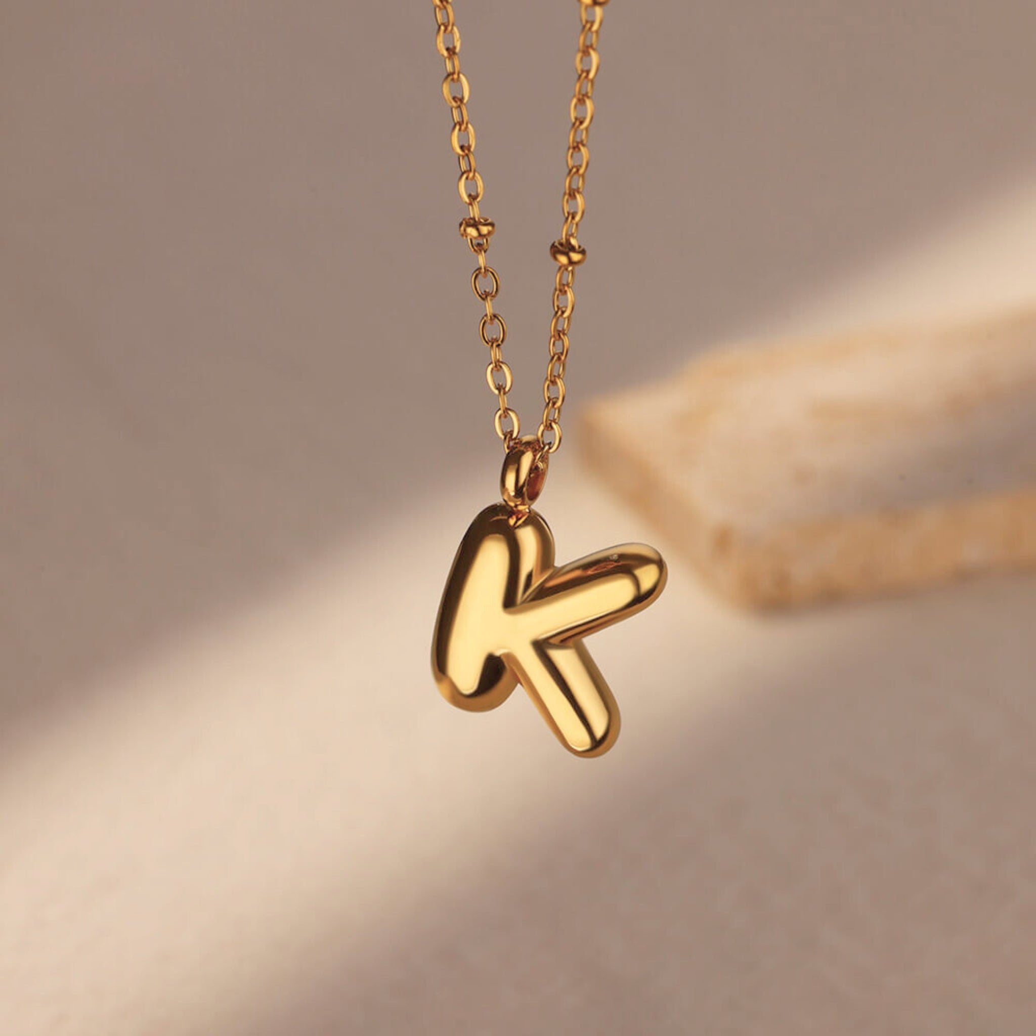 18K Gold Plated Stainless Steel Hypoallergenic Waterproof Tarnish Free Waterproof Sweatproof No-Fade Bubbly Alphabet Necklace The Aura