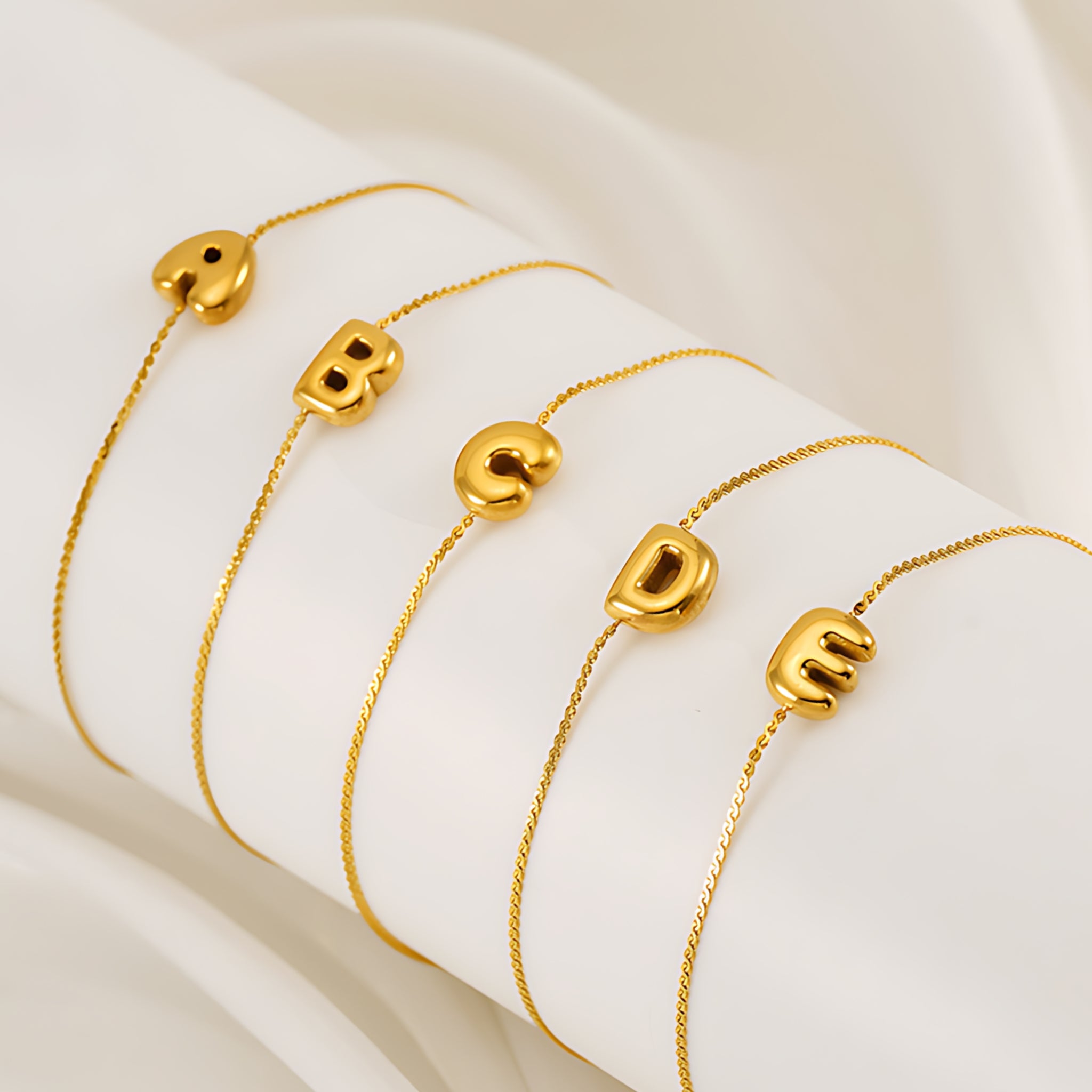 18K Gold Plated Stainless Steel Hypoallergenic Waterproof Tarnish Free Waterproof Sweatproof No-Fade Mini Bubbly Alphabet Bracelet The Aura