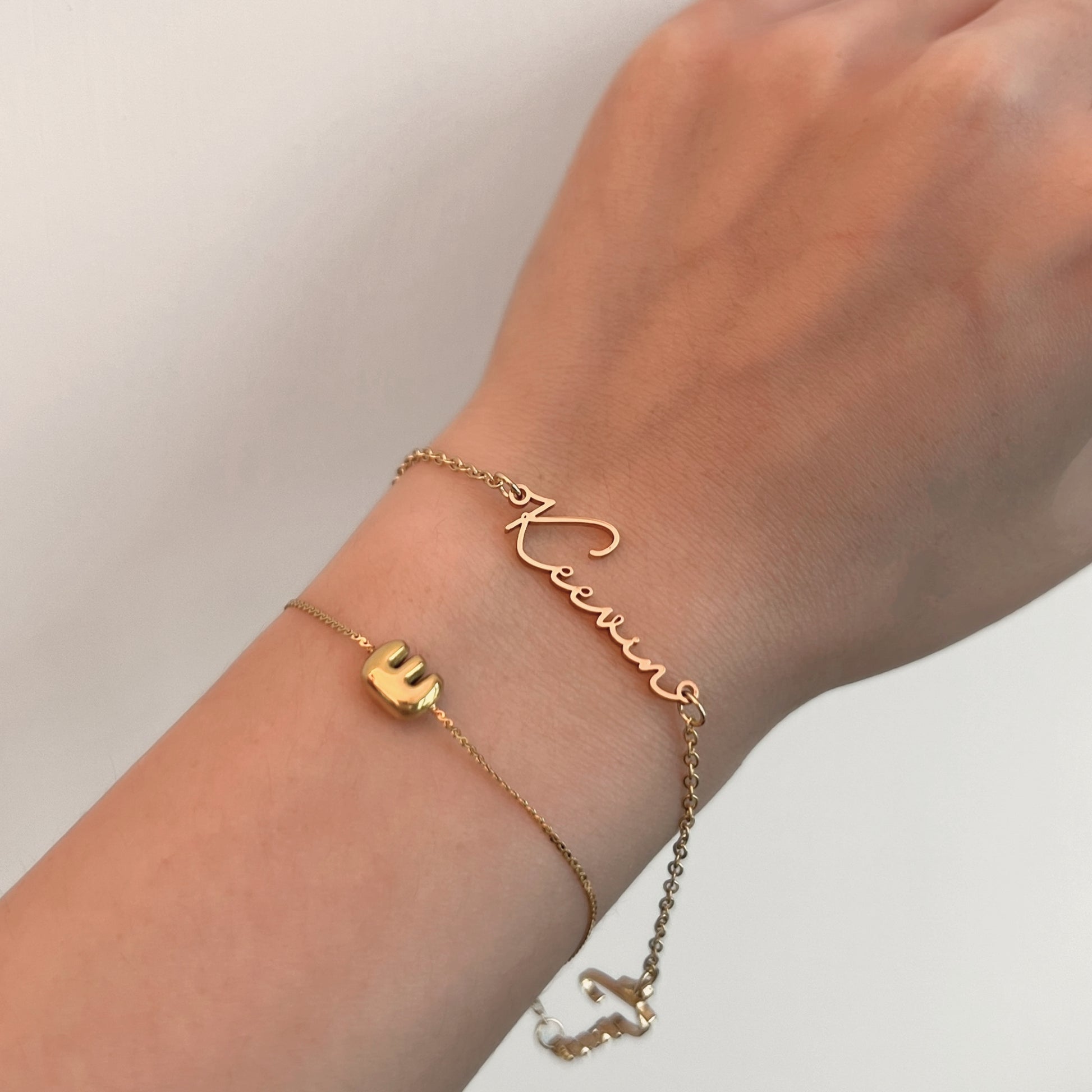 18K Gold Plated Stainless Steel Hypoallergenic Waterproof Tarnish Free Waterproof Sweatproof No-Fade Mini Bubbly Alphabet Bracelet The Aura