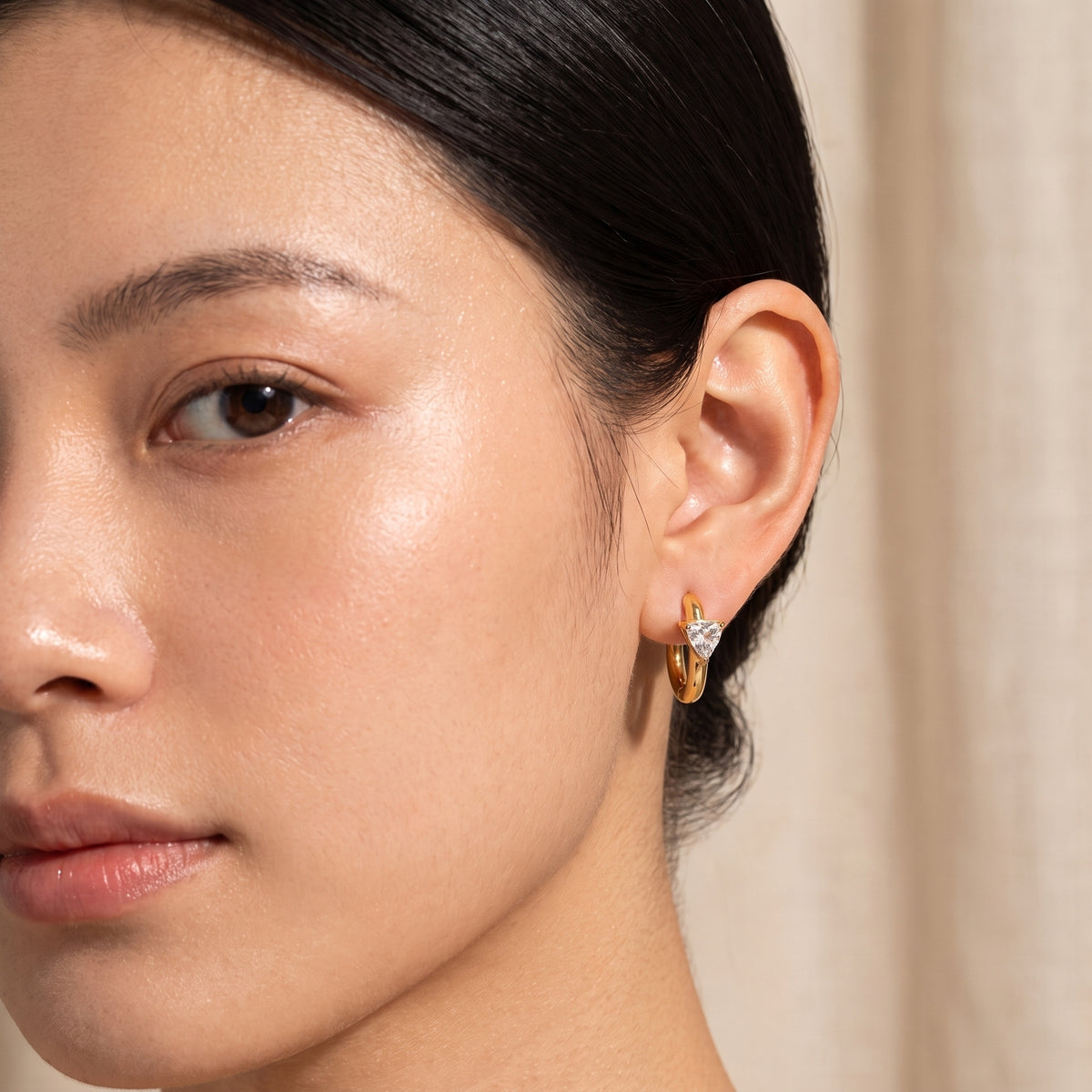 Solo Delta Huggie Earrings